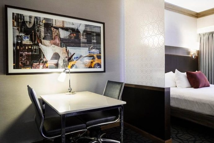 Imagen de la habitación del Hotel Hilton Club New York. Foto 9