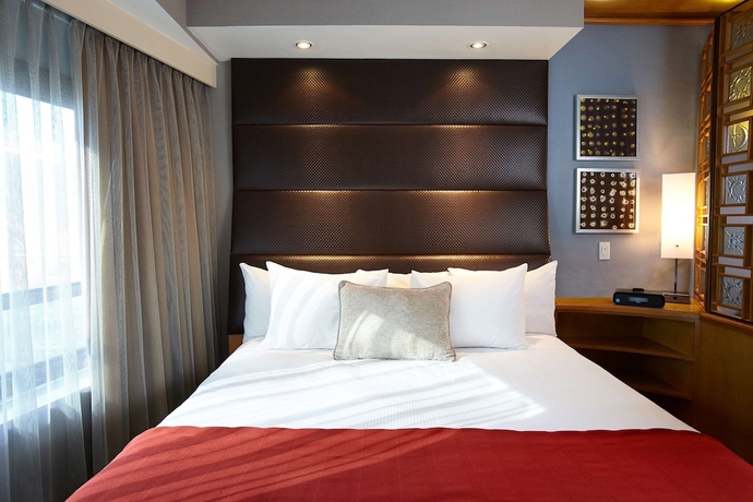 Imagen de la habitación del Hotel Hilton Club New York. Foto 12