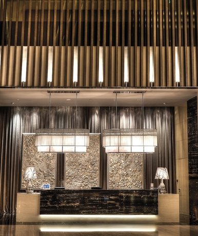 Imagen de los interiores del Hotel Hilton Dalian. Foto 17