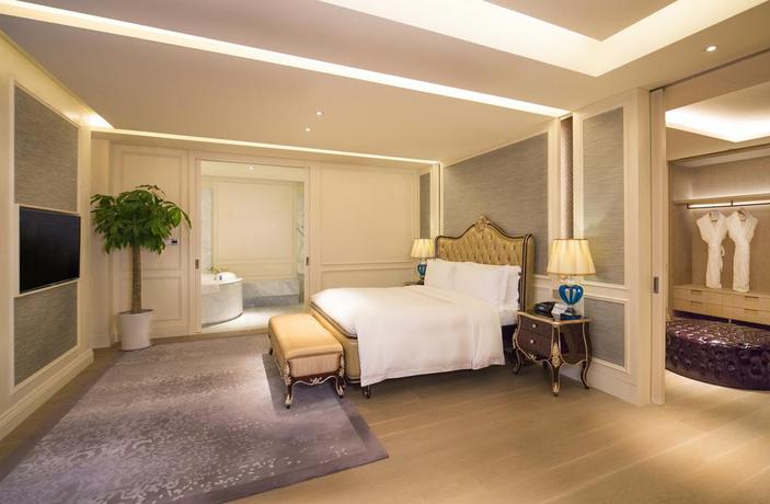 Imagen de la habitación del Hotel Hilton Dalian Golden Pebble Beach Resort. Foto 9
