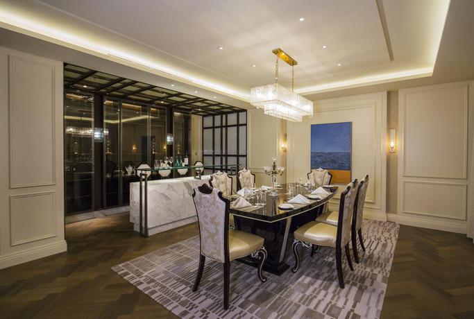 Imagen de la habitación del Hotel Hilton Dalian Golden Pebble Beach Resort. Foto 10