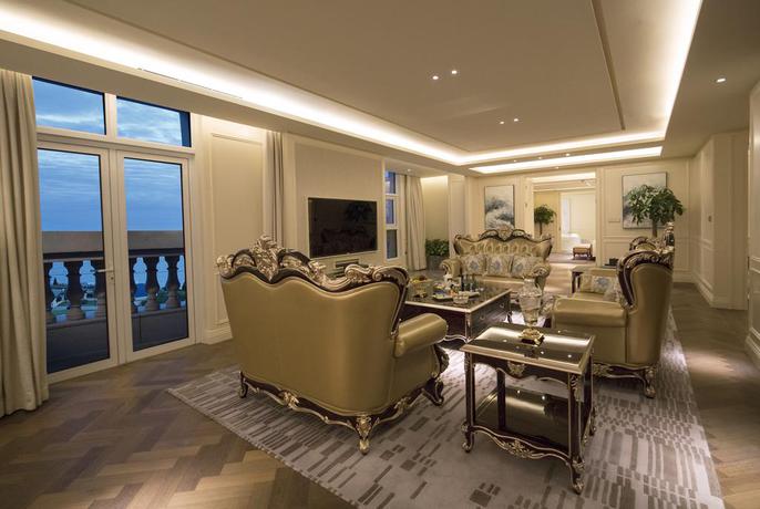 Imagen de la habitación del Hotel Hilton Dalian Golden Pebble Beach Resort. Foto 11