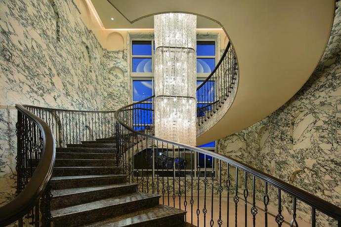 Imagen de los interiores del Hotel Hilton Dalian Golden Pebble Beach Resort. Foto 16