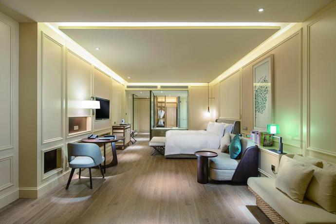 Imagen de la habitación del Hotel Hilton Dalian Golden Pebble Beach Resort. Foto 14