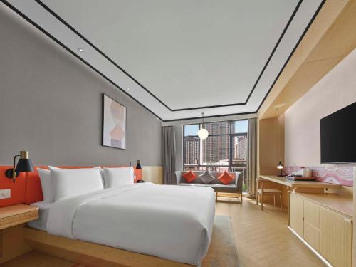 Imagen de la habitación del Hotel Hilton Garden Inn Aksu Downtown. Foto 15