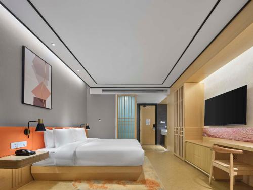 Imagen de la habitación del Hotel Hilton Garden Inn Aksu Downtown. Foto 17