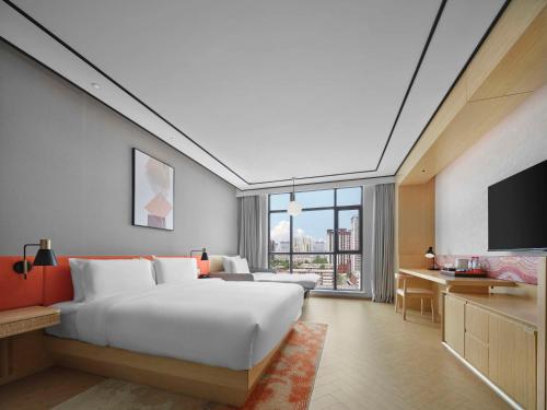 Imagen de la habitación del Hotel Hilton Garden Inn Aksu Downtown. Foto 17