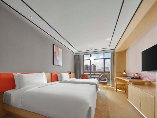 Imagen de la habitación del Hotel Hilton Garden Inn Aksu Downtown. Foto 18