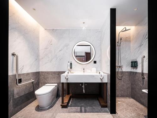 Imagen de la habitación del Hotel Hilton Garden Inn Anqing Susong. Foto 8