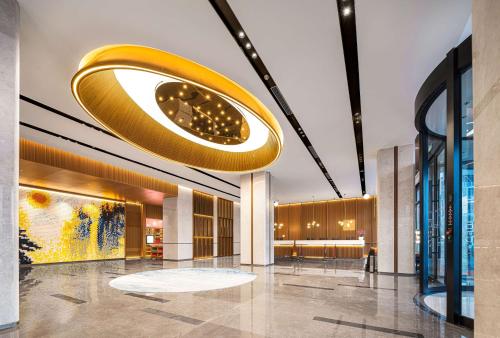 Imagen de los interiores del Hotel Hilton Garden Inn Anqing Susong. Foto 11
