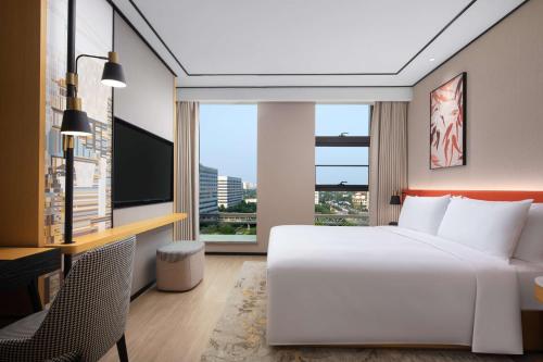 Imagen de la habitación del Hotel Hilton Garden Inn Beijing Huaxiang Tiantan Hospital. Foto 3