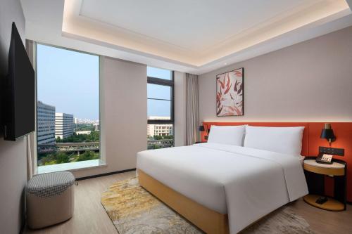 Imagen de la habitación del Hotel Hilton Garden Inn Beijing Huaxiang Tiantan Hospital. Foto 6