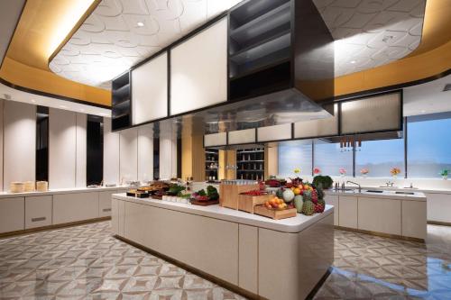 Imagen de los interiores del Hotel Hilton Garden Inn Beijing Huaxiang Tiantan Hospital. Foto 13