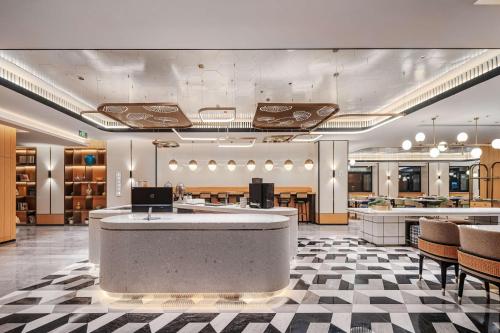 Imagen del bar/restaurante del Hotel Hilton Garden Inn Beijing Temple of Heaven East Gate Station. Foto 3