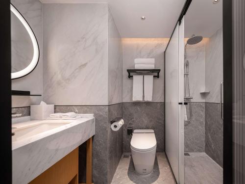 Imagen de la habitación del Hotel Hilton Garden Inn Beijing Temple of Heaven East Gate Station. Foto 8