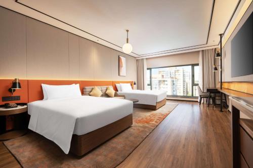 Imagen de la habitación del Hotel Hilton Garden Inn Beijing West Railway Station. Foto 9