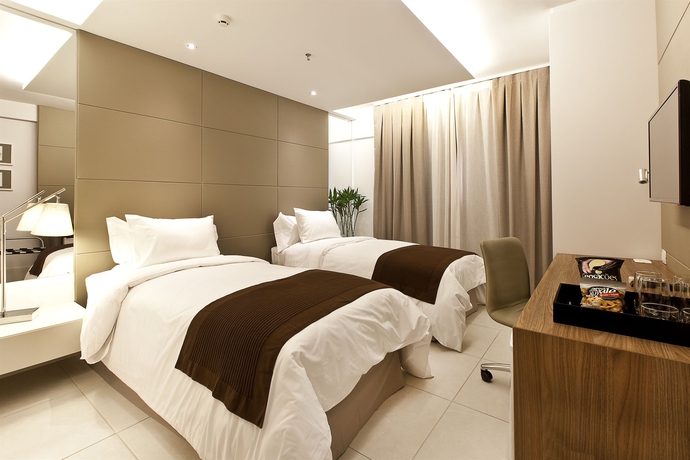 Imagen de la habitación del Hotel Hilton Garden Inn Belo Horizonte, Brazil. Foto 7