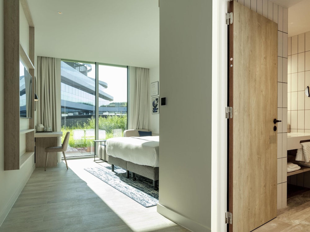 Imagen de la habitación del Hotel Hilton Garden Inn Brussels Airport. Foto 11