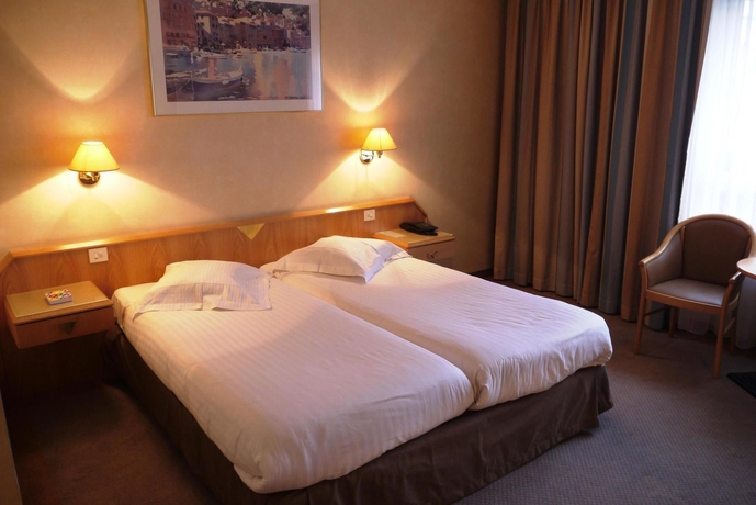 Imagen de la habitación del Hotel Hilton Garden Inn Brussels City Centre. Foto 4