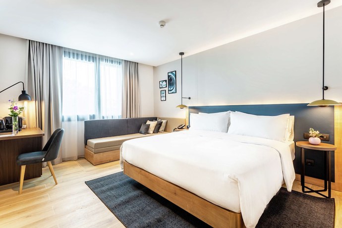 Imagen de la habitación del Hotel Hilton Garden Inn Bucharest Airport. Foto 8