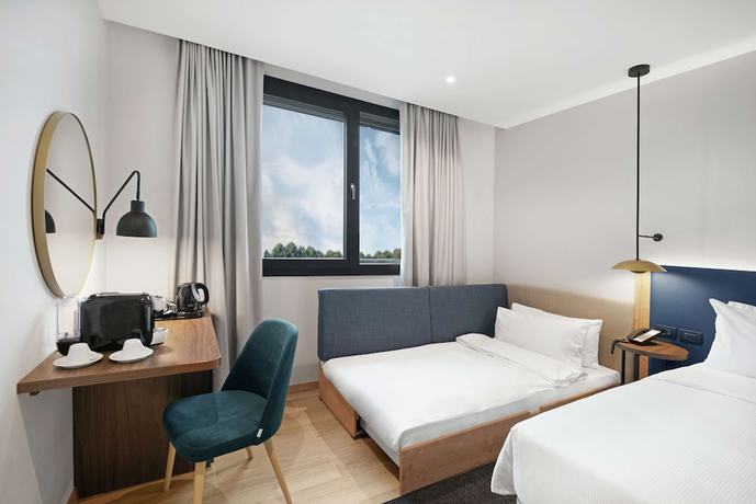 Imagen de la habitación del Hotel Hilton Garden Inn Bucharest Airport. Foto 14