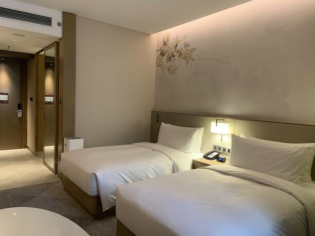 Imagen de la habitación del Hotel Hilton Garden Inn Changzhou Jintan. Foto 11