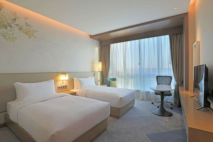 Imagen de la habitación del Hotel Hilton Garden Inn Changzhou Jintan. Foto 14