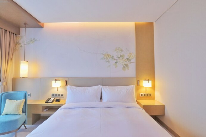 Imagen de la habitación del Hotel Hilton Garden Inn Changzhou Jintan. Foto 31