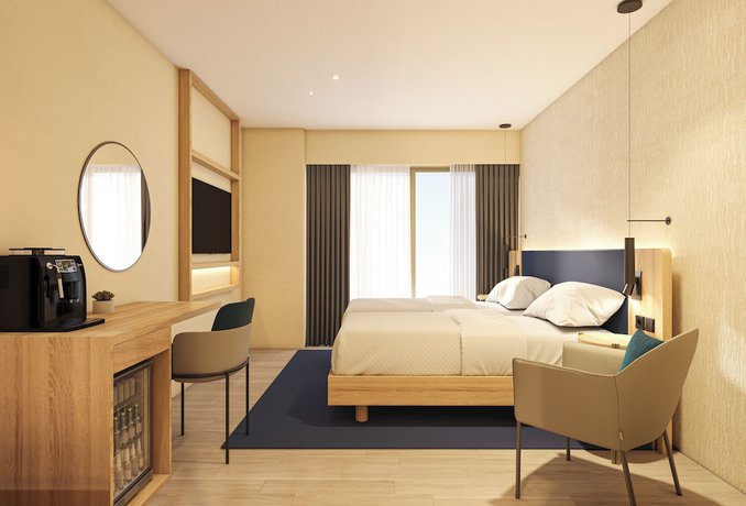 Imagen de la habitación del Hotel Hilton Garden Inn Chania City. Foto 8