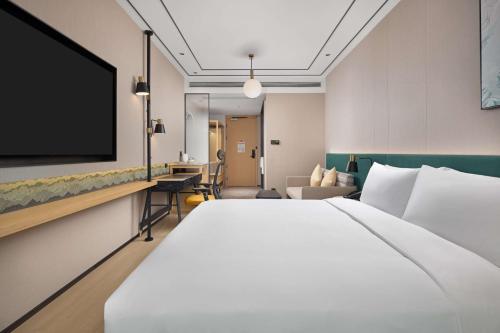 Imagen de la habitación del Hotel Hilton Garden Inn Chengdu Chunxi Road Center. Foto 13