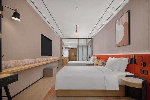 Imagen de la habitación del Hotel Hilton Garden Inn Chengdu Chunxi Road Center. Foto 19