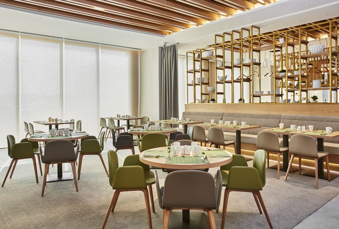 Imagen del bar/restaurante del Hotel Hilton Garden Inn Dubai, Mall Avenue. Foto 1