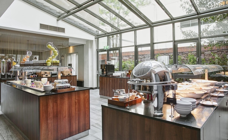 Imagen del bar/restaurante del Hotel Hilton Garden Inn Dublin City Centre. Foto 3