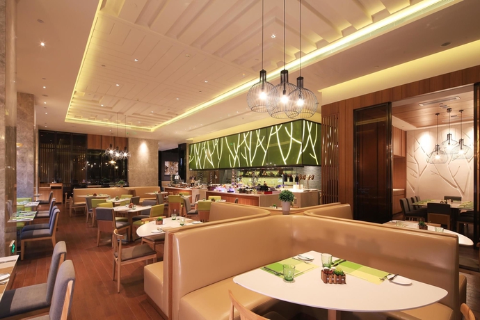 Imagen del bar/restaurante del Hotel Hilton Garden Inn Fuzhou Cangshan. Foto 2
