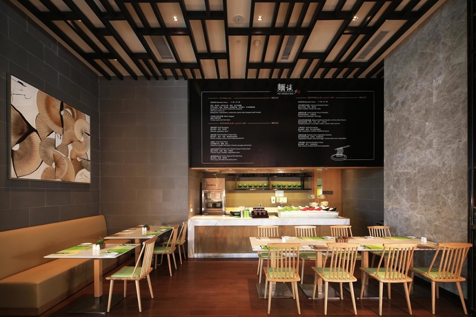 Imagen del bar/restaurante del Hotel Hilton Garden Inn Fuzhou Cangshan. Foto 3