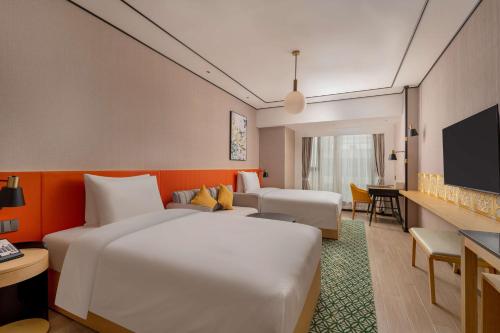 Imagen de la habitación del Hotel Hilton Garden Inn Guangzhou Airport Aerotropolis - Free shuttle to Airport. Foto 13