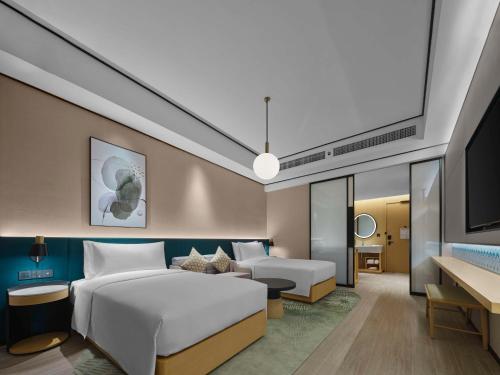 Imagen de la habitación del Hotel Hilton Garden Inn Guilin Yangshuo. Foto 12