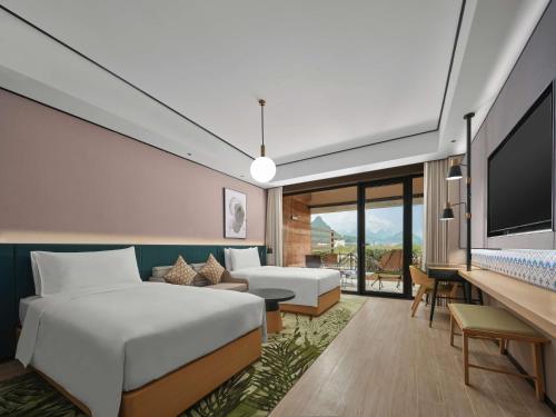 Imagen de la habitación del Hotel Hilton Garden Inn Guilin Yangshuo. Foto 14