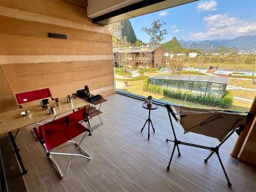 Imagen de la habitación del Hotel Hilton Garden Inn Guilin Yangshuo. Foto 16