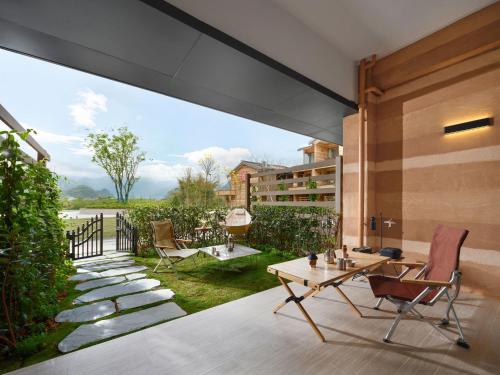 Imagen de la habitación del Hotel Hilton Garden Inn Guilin Yangshuo. Foto 19