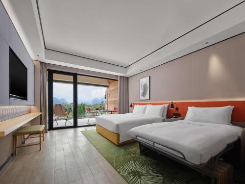 Imagen de la habitación del Hotel Hilton Garden Inn Guilin Yangshuo. Foto 20