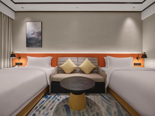 Imagen de la habitación del Hotel Hilton Garden Inn Huaihua Anjiang. Foto 15