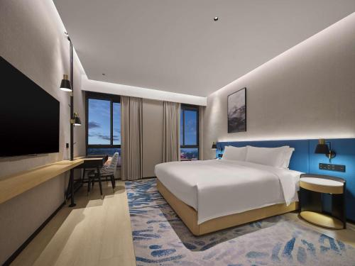 Imagen de la habitación del Hotel Hilton Garden Inn Huaihua Anjiang. Foto 17