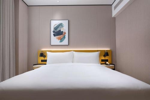 Imagen de la habitación del Hotel Hilton Garden Inn Hulunbuir Hailar. Foto 19