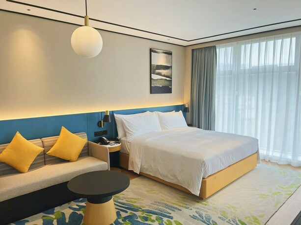 Imagen de la habitación del Hotel Hilton Garden Inn Huzhou Anji Phoenix Mountain. Foto 12