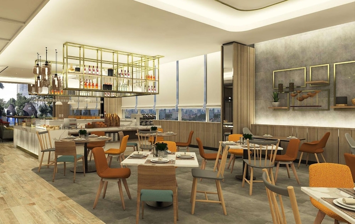 Imagen del bar/restaurante del Hotel Hilton Garden Inn Jakarta Taman Palem. Foto 2