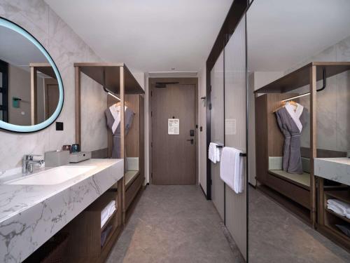 Imagen de la habitación del Hotel Hilton Garden Inn Ji\'Nan High-Tech Zone. Foto 18