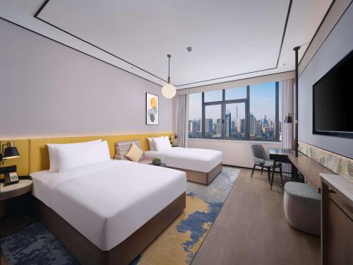 Imagen de la habitación del Hotel Hilton Garden Inn Ji\'Nan High-Tech Zone. Foto 19
