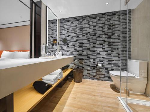 Imagen de la habitación del Hotel Hilton Garden Inn Jinzhong Yuci. Foto 20