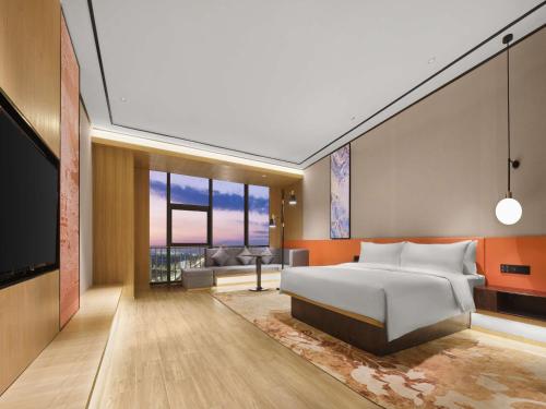 Imagen de la habitación del Hotel Hilton Garden Inn Jinzhong Yuci. Foto 17